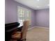 Bedroom with wood floors, natural light, and desk area at 23 Shetland Ct, Highlands Ranch, CO 80130
