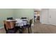 Dining room with wood floors and natural light at 23 Shetland Ct, Highlands Ranch, CO 80130