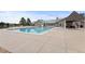 Community pool surrounded by ample deck space perfect for relaxing and soaking up the sun at 23 Shetland Ct, Highlands Ranch, CO 80130