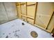 Unfinished basement with wall framing and concrete flooring at 930 Button Rock Dr # 29, Longmont, CO 80504