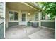 Unit 29 entrance with green door and convenient access at 930 Button Rock Dr # 29, Longmont, CO 80504