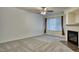Spacious living room with carpet and fireplace at 930 Button Rock Dr # 29, Longmont, CO 80504
