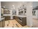 Basement kitchen featuring granite counters, stainless steel appliances, and open sight lines at 19495 W 94Th Ave, Arvada, CO 80007