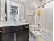Modern bathroom with sleek vanity, glass-enclosed shower, and contemporary fixtures at 19495 W 94Th Ave, Arvada, CO 80007