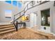 Bright and inviting foyer with high ceilings, modern staircase, and hardwood floors at 19495 W 94Th Ave, Arvada, CO 80007