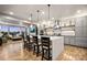 Spacious kitchen with a large island, modern stainless steel appliances, and sleek cabinets at 19495 W 94Th Ave, Arvada, CO 80007
