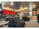 Amazing theater room with reclining seats, a projector, and mood lighting for the ultimate movie-watching experience at 19495 W 94Th Ave, Arvada, CO 80007