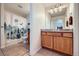 Full bathroom with shower/tub combo and wood vanity at 3805 Windriver Trl, Castle Rock, CO 80109