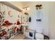 Clean bathroom with a pedestal sink, toilet, and shower/tub combo at 3805 Windriver Trl, Castle Rock, CO 80109