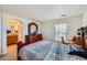 Main bedroom with a dresser and en-suite bathroom at 3805 Windriver Trl, Castle Rock, CO 80109