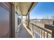 Front porch with railing, steps, and view of the neighborhood at 3805 Windriver Trl, Castle Rock, CO 80109