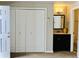 Bedroom with closet and ensuite bathroom at 1614 Secrest St, Golden, CO 80401