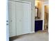 Bedroom with closet and ensuite bathroom at 1614 Secrest St, Golden, CO 80401