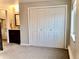 Bedroom with closet and ensuite bathroom at 1614 Secrest St, Golden, CO 80401