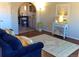 Cozy living room with hardwood floors, a rug, and a view of the dining room at 1614 Secrest St, Golden, CO 80401