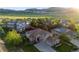 Sprawling suburban community nestled in scenic landscape with mountain backdrop at 5364 Dunraven Cir, Golden, CO 80403