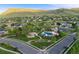 Aerial view of the neighborhood featuring community park, pool, and green spaces at 5364 Dunraven Cir, Golden, CO 80403