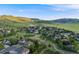 Aerial view of a charming neighborhood with lush green spaces and walking paths at 5364 Dunraven Cir, Golden, CO 80403