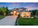 Stunning brick and stucco home with an inviting entrance and manicured front yard at 5364 Dunraven Cir, Golden, CO 80403