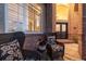 Cozy covered porch with comfortable seating perfect for enjoying outdoor moments at 5364 Dunraven Cir, Golden, CO 80403