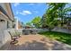 Expansive wooden back deck with seating and grill, ideal for summer barbecues and outdoor enjoyment at 6143 S Ash E Cir, Centennial, CO 80121