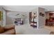 Inviting living room features neutral paint color and an open railing at 6143 S Ash E Cir, Centennial, CO 80121