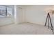 Bedroom features neutral walls, carpeted floor, window, base molding, and closet at 23709 Glenmoor Dr, Parker, CO 80138