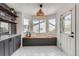 Cozy breakfast nook with a window seat and stylish decor, perfect for casual dining at 23709 Glenmoor Dr, Parker, CO 80138