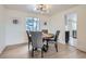 Comfortable dining room featuring a round table and chairs, with natural light streaming in at 23709 Glenmoor Dr, Parker, CO 80138