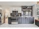 Well-equipped kitchen featuring stainless steel appliances, stylish backsplash and tile flooring at 23709 Glenmoor Dr, Parker, CO 80138