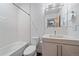 Elegant bathroom features a contemporary vanity, a chic, minimalist design, and a refreshing shower area at 3135 W 25Th Ave, Denver, CO 80211