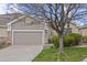 Charming single-Gathering home with a two-car garage and landscaped front yard at 22312 E Plymouth Cir, Aurora, CO 80016