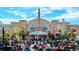Outdoor concert at AMC Southlands movie theater surrounded by a shopping center at 22312 E Plymouth Cir, Aurora, CO 80016