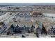 Aerial view of apartment complex with mountain views in the background at 14221 E 1St Dr # 304, Aurora, CO 80011