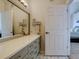 Modern bathroom with updated vanity and fixtures at 14221 E 1St Dr # 304, Aurora, CO 80011