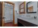 Bathroom with shower and vanity with sink at 7088 Indian Peaks Trl, Boulder, CO 80301