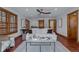 Open living room with plenty of light and wood floors at 7088 Indian Peaks Trl, Boulder, CO 80301