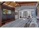 Inviting main bedroom with a fireplace, wood accents, and natural light at 7088 Indian Peaks Trl, Boulder, CO 80301