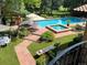 Outdoor pool and spa with patio and landscaping at 7088 Indian Peaks Trl, Boulder, CO 80301