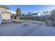 Spacious backyard features a large brick patio, grass yard, and privacy fence at 3801 S Joplin St, Aurora, CO 80013