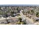 Neighborhood aerial view showcasing many homes nestled among mature trees and wide streets at 6902 S Jackson Way, Centennial, CO 80122