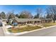 Charming ranch-style home with well-maintained landscaping and inviting front porch at 6902 S Jackson Way, Centennial, CO 80122