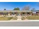 Charming single-story home featuring a landscaped front yard with a welcoming entrance and inviting curb appeal at 6902 S Jackson Way, Centennial, CO 80122