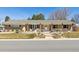 Charming single-story home featuring a landscaped front yard with a welcoming entrance and inviting curb appeal at 6902 S Jackson Way, Centennial, CO 80122