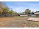Large backyard with wood fence providing privacy and security at 14830 Robins Dr, Denver, CO 80239