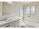 Clean, bright bathroom with updated fixtures and tile shower at 14830 Robins Dr, Denver, CO 80239