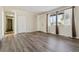 Spacious living room with ample natural light and a large closet for storage at 14830 Robins Dr, Denver, CO 80239