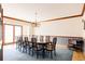 Elegant dining room features large table, chandelier, and room to entertain at 14080 Crabapple Rd, Golden, CO 80401