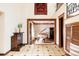 Inviting foyer featuring tile floor, staircase, and an open concept at 14080 Crabapple Rd, Golden, CO 80401