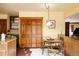 Charming eat-in kitchen with classic cabinets, breakfast table and unique tile floors at 14080 Crabapple Rd, Golden, CO 80401